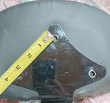 Custom Harley backrest plate with punisher stretching through