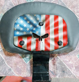 Custom Harley backrest plate with punisher stretching through