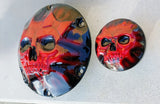Skull and bow pushing through on Harley Davidson derby cover and fuel cap