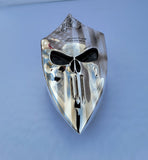 Chrome Harley horn cover with punisher stretching through