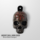 3D ancient skull with tattered American flag