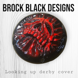 Looking up skull through on Harley Davidson derby cover