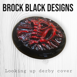 Looking up skull through on Harley Davidson derby cover