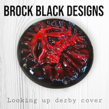Looking up skull through on Harley Davidson derby cover